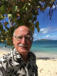 Gregory Cook on a beach.